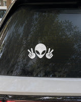 Peace Alien car patch in white on a car