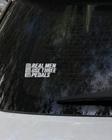 Three Pedals car patch in white on a car
