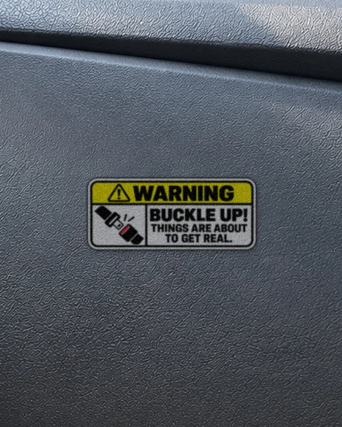 Buckle Up Warning car patch on a car