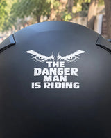 Danger Man Riding bike patch in white ink on a helmet