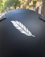 Free Feather bike patch in white ink on a helmet