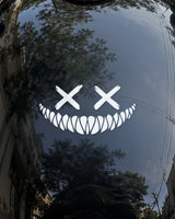 Grin Reaper bike patch in white ink on a bike