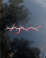 Lightning Strike bike patch in white ink on a bike