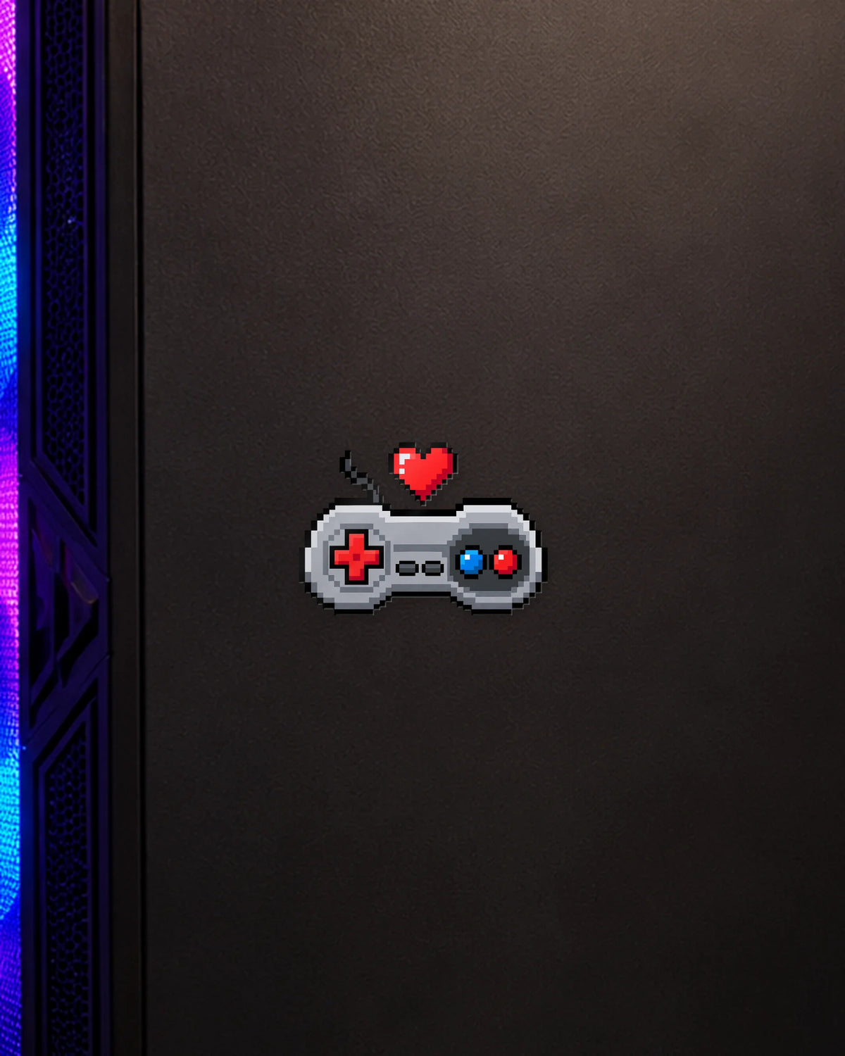 8-Bit Love gamer patch on a gaming PC cabinet