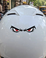 Angry Eyes bike patch in black ink on a helmet