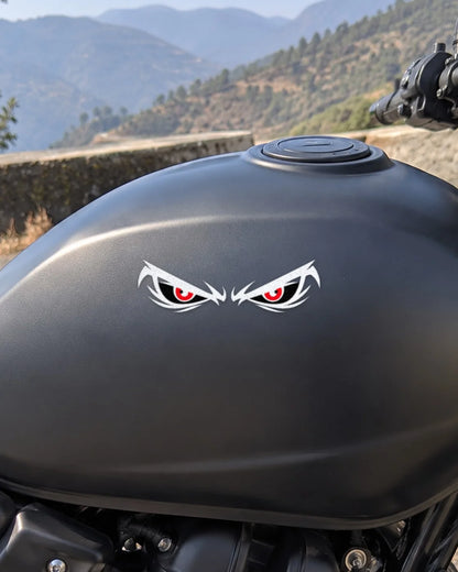 Angry Eyes bike patch in white ink on a bike