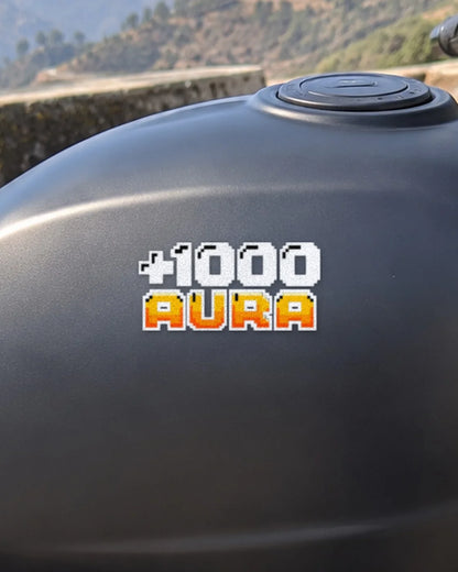 +1000 Aura bike patch in white ink on a bike