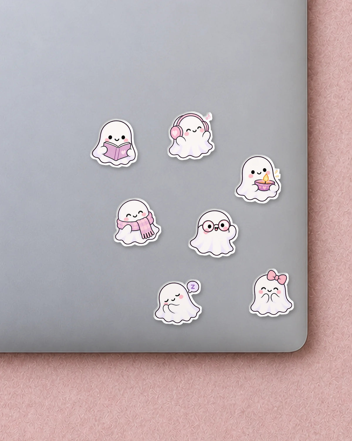 Boo Crew mini patches on a laptop