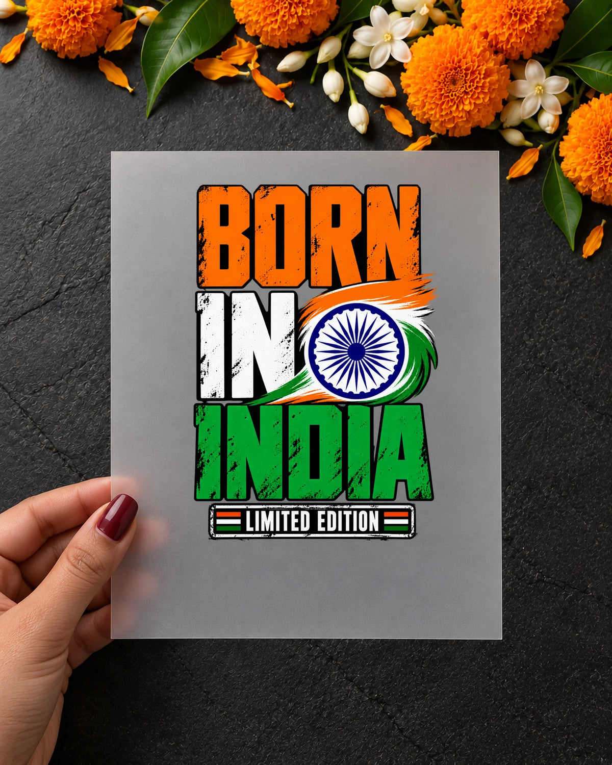 Born in India iron-on patch in hand