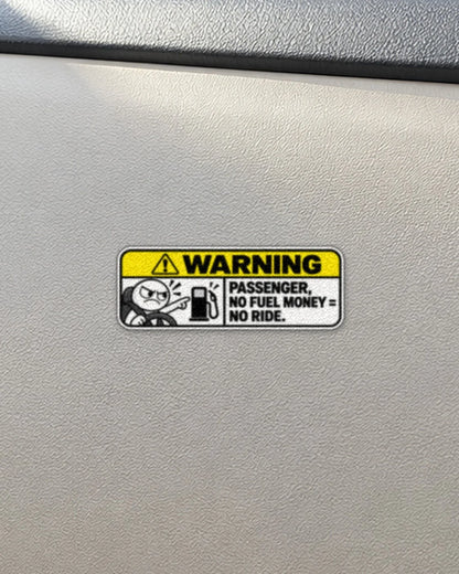 No Fuel Money No Ride car patch on a car