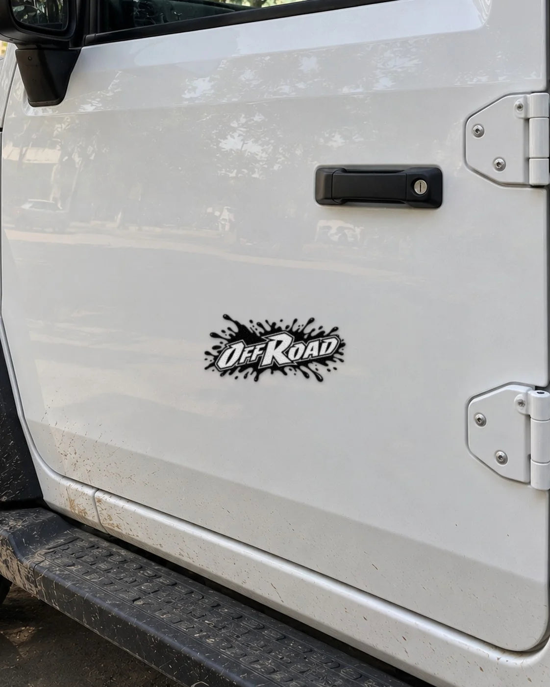 Off Road car patch in black on a car