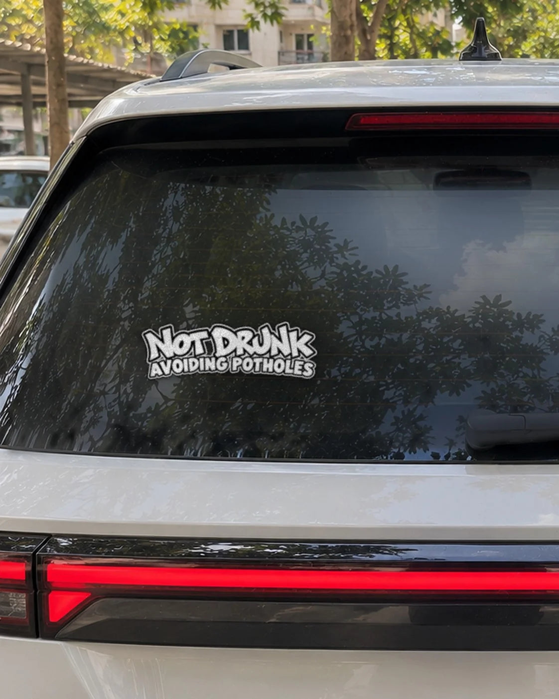 Not Drunk Avoiding Potholes car patch in white on a car