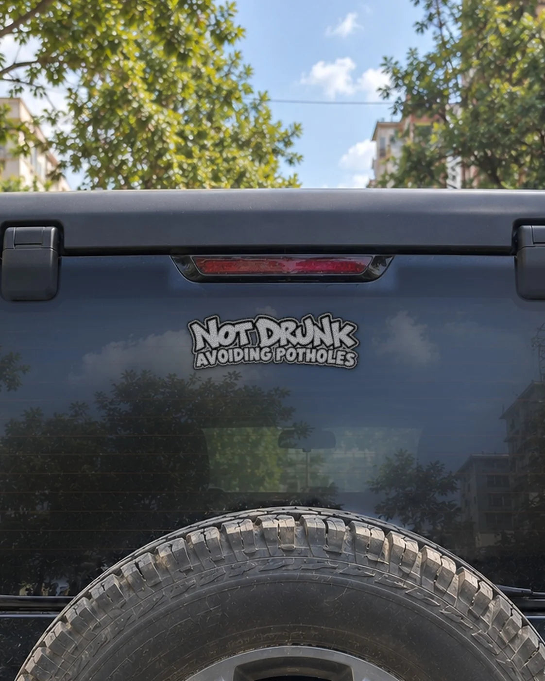 Not Drunk Avoiding Potholes car patch in white on a car