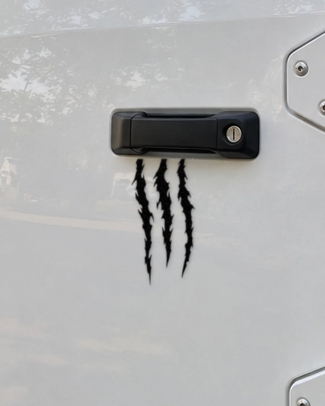 Claw Marks car patch in black on a car