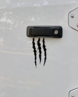 Claw Marks car patch in black on a car