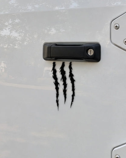 Claw Marks car patch in black on a car