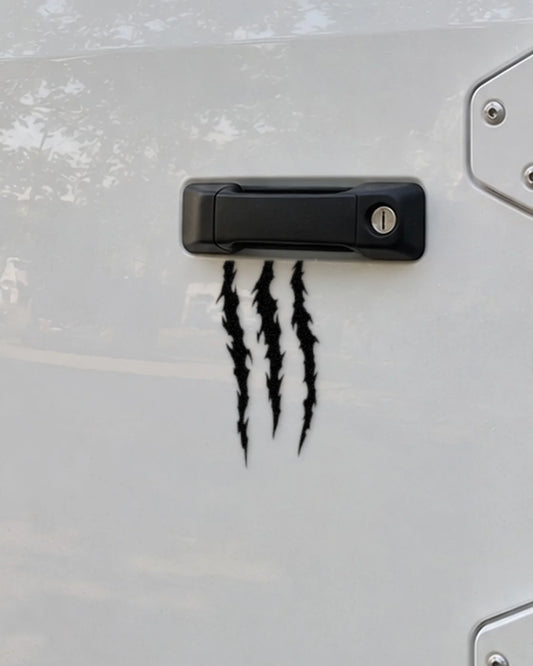 Claw Marks car patch in black on a car