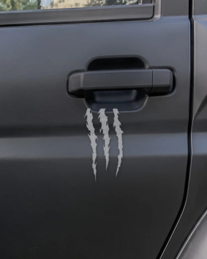 Claw Marks car patch in white on a car
