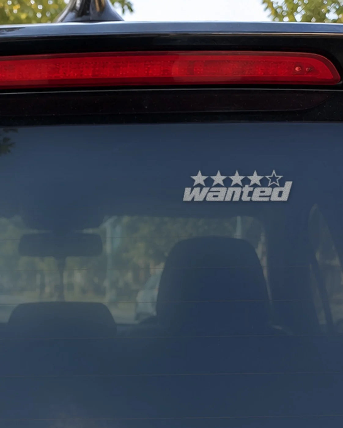 Wanted car patch in white on a car