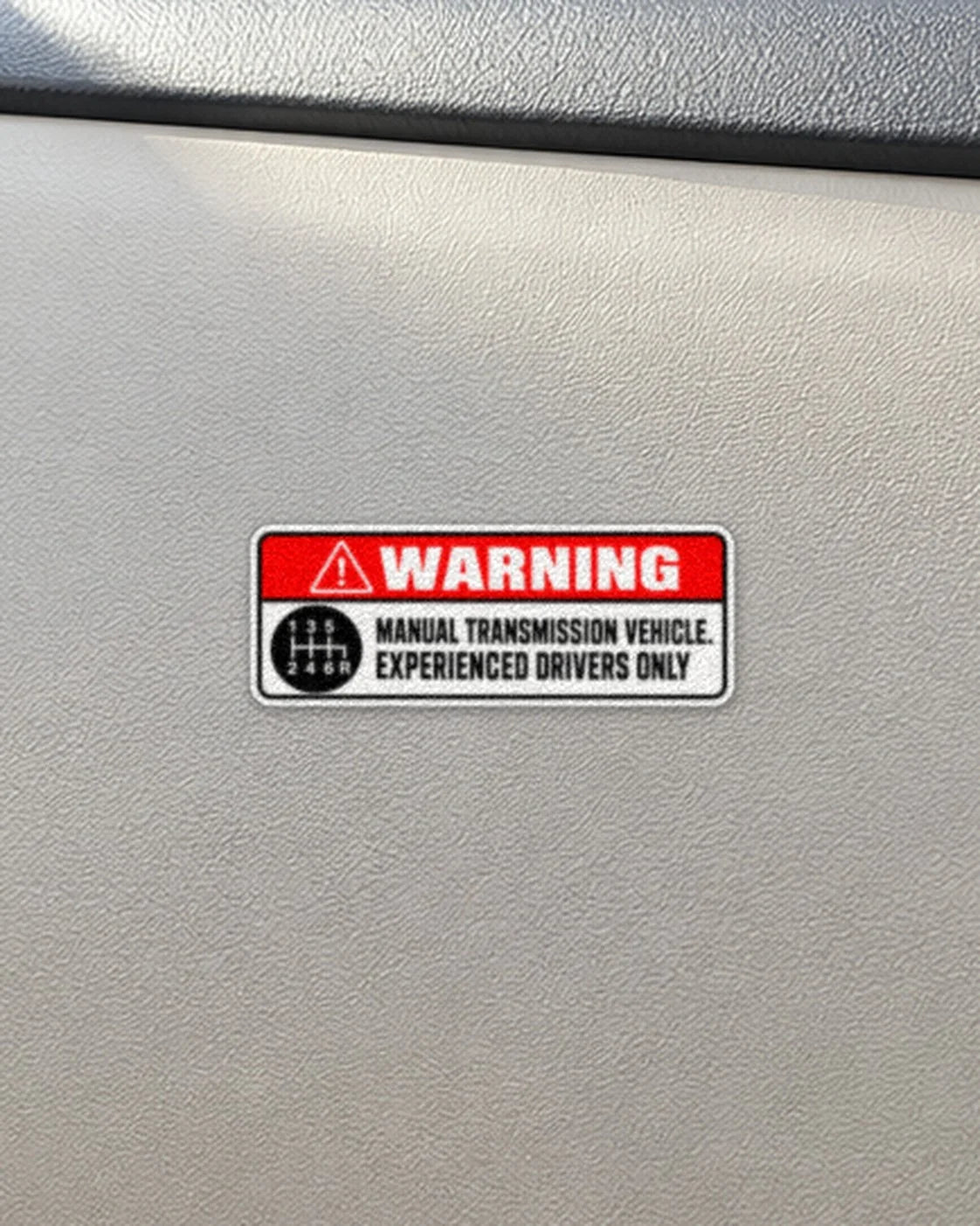 Manual Only Warning car patch on a car