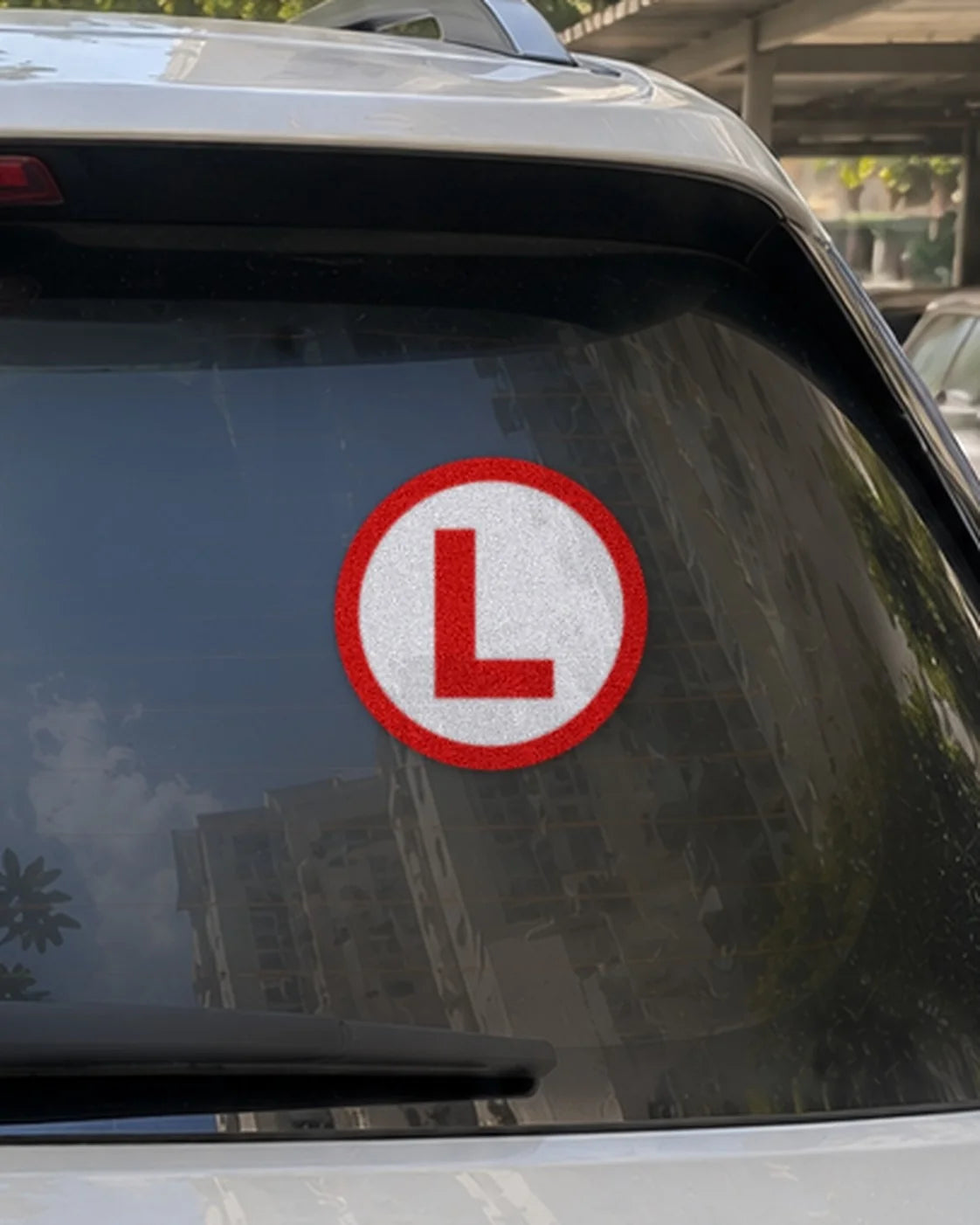 Learner L car patch on a car