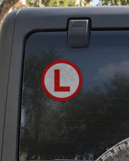 Learner L car patch on a car