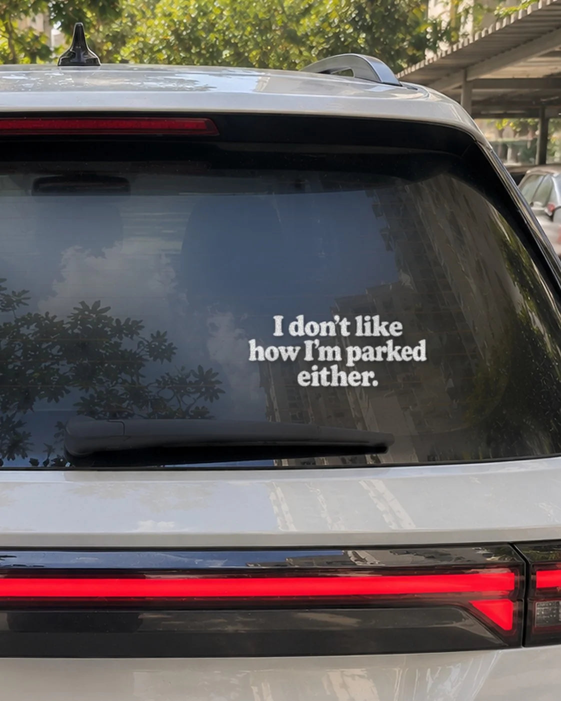 Parked Either car patch in white on a car