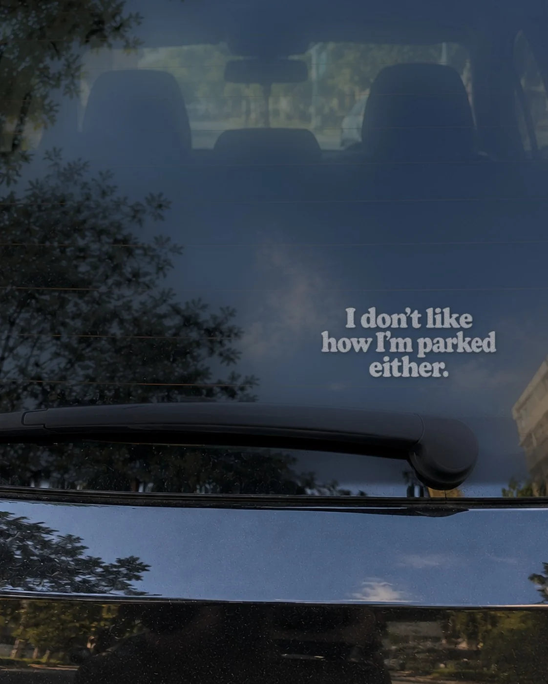 Parked Either car patch in white on a car