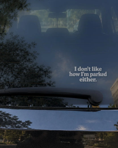 Parked Either car patch in white on a car