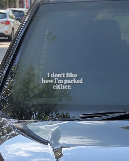 Parked Either car patch in white on a car