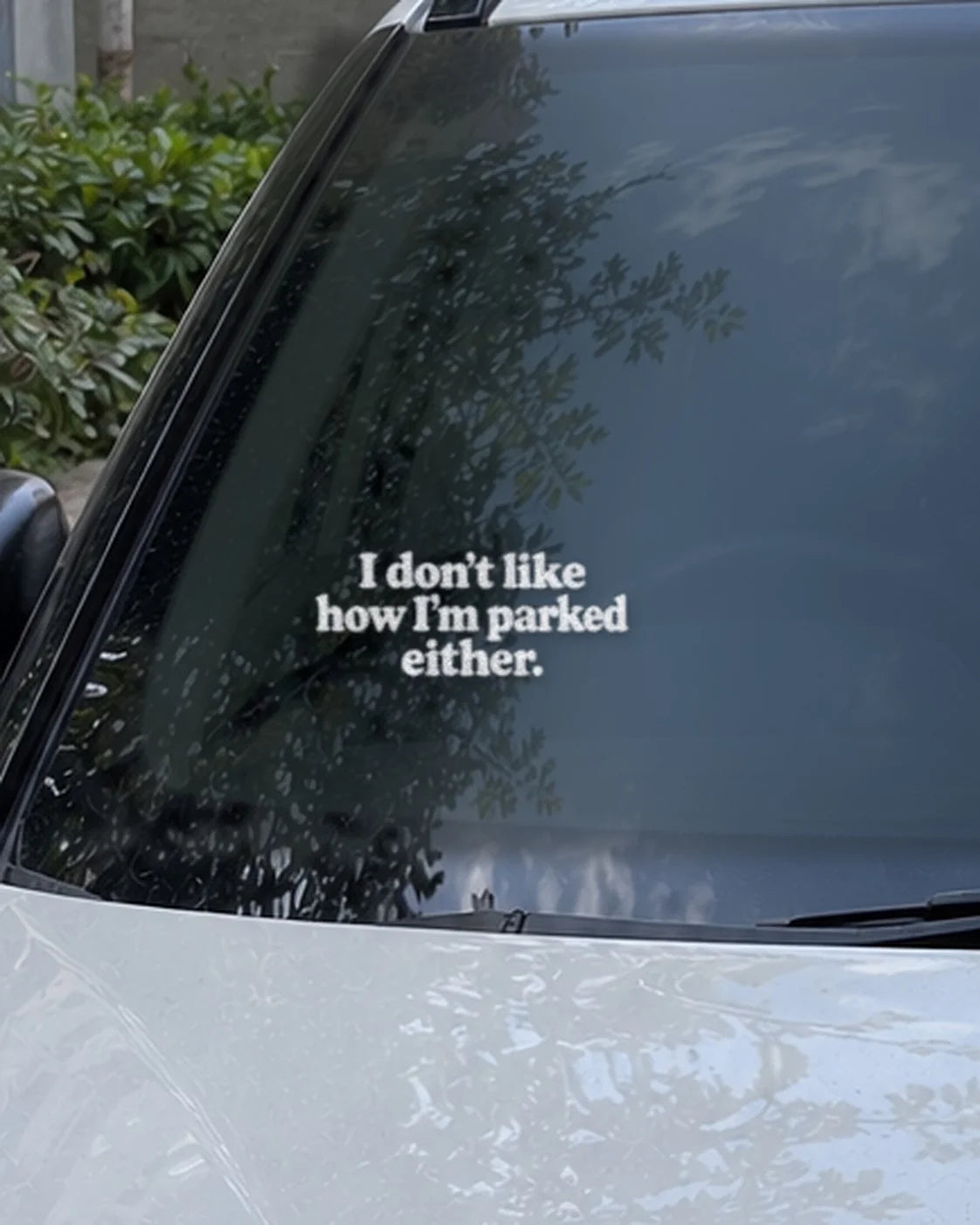 Parked Either car patch in white on a car
