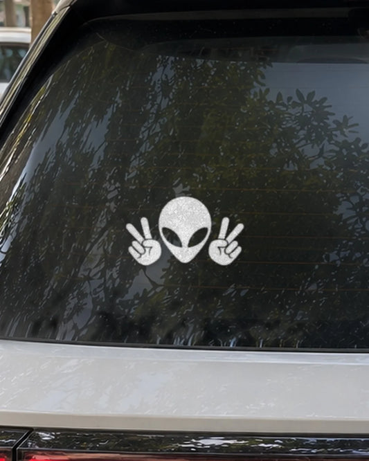 Peace Alien car patch in white on a car