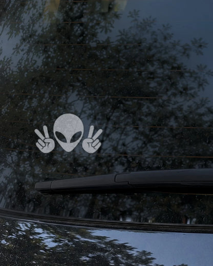 Peace Alien car patch in white on a car