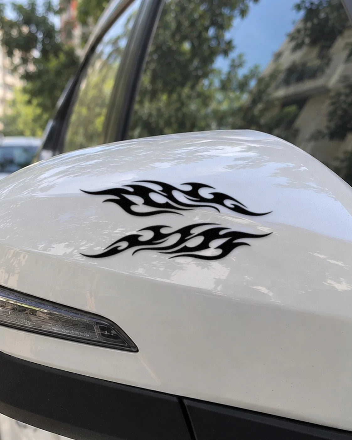 Mirror Flames car patch in black on a car