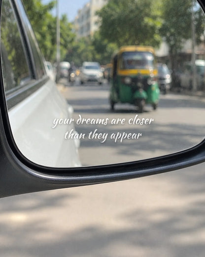 Dreams Closer car patch in white on a car