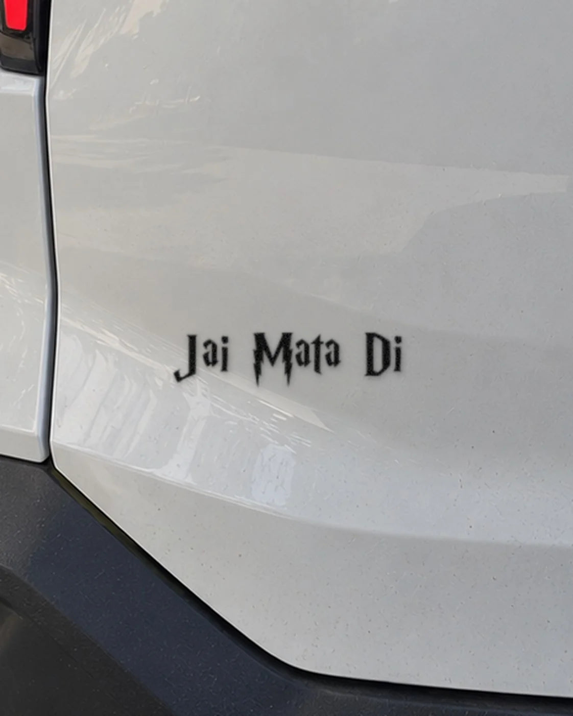 Custom black text on a white car boot