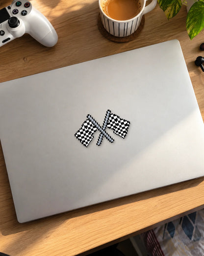 Checkered Flags gamer patch on a laptop