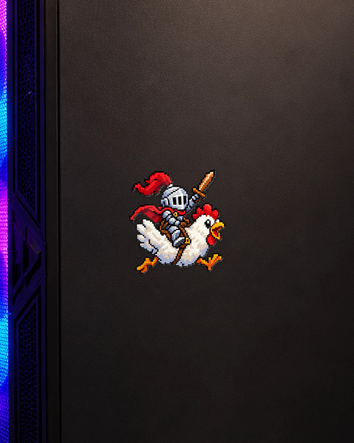 Chicken Rider gamer patch on a gaming PC cabinet