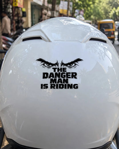 Danger Man Riding bike patch in black ink on a helmet