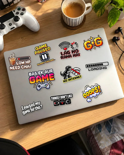 Desi Gamer Pack in black ink: 10 gamer patches on a white laptop