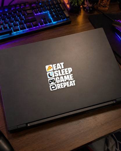Eat Sleep Game Repeat gamer patch in white ink on a gaming laptop