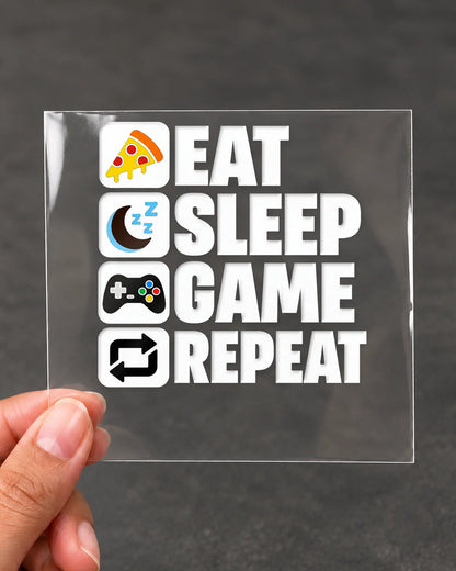 Eat Sleep Game Repeat gamer patch in white ink on clear film