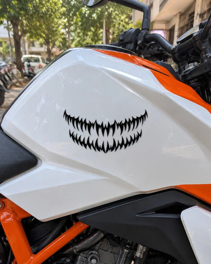 Fang Grill bike patch in black ink on a bike