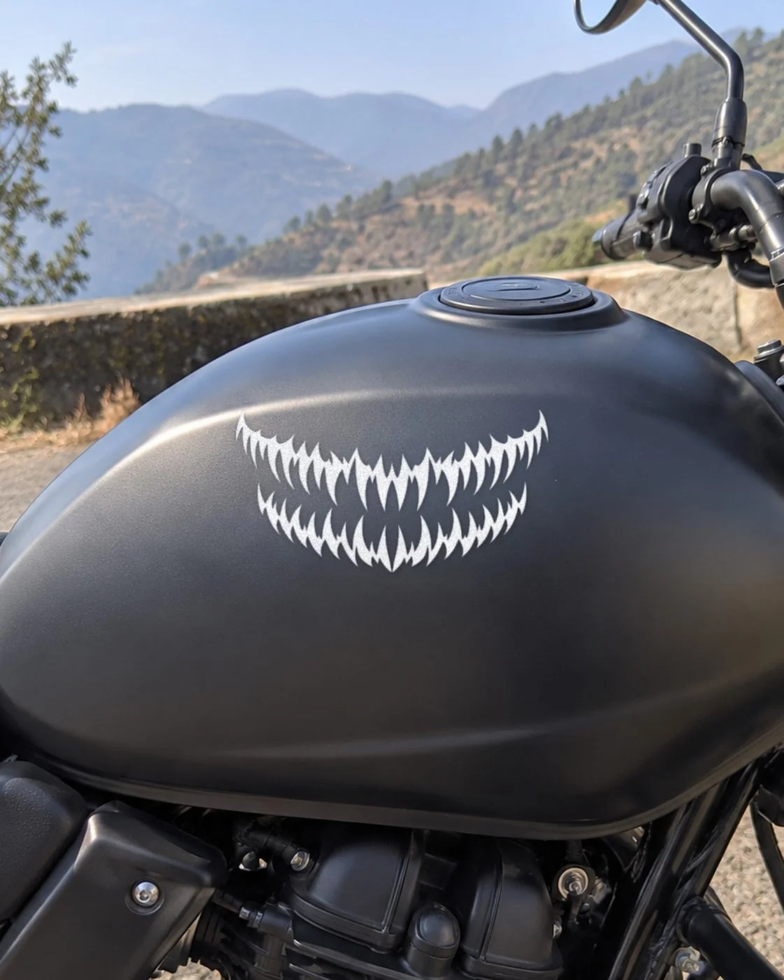 Fang Grill bike patch in white ink on a bike