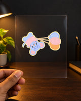 Floating Through Life hard surface patch on clear film