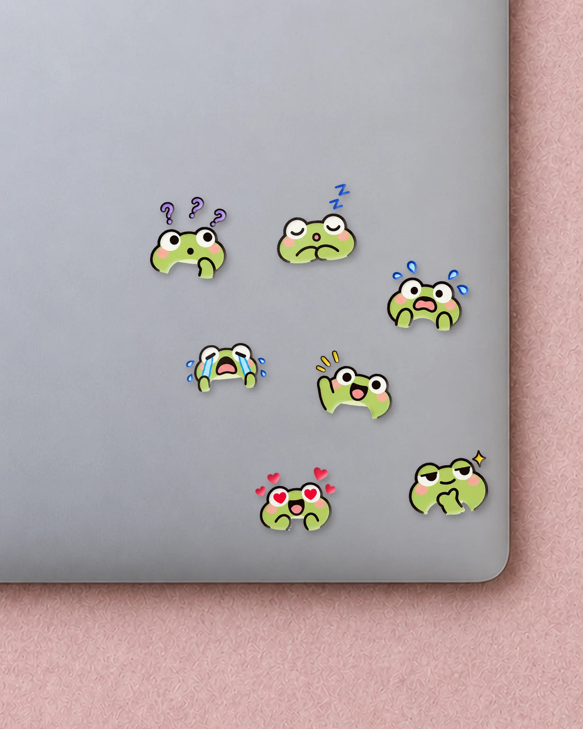 Froggy Feels mini patches on a laptop