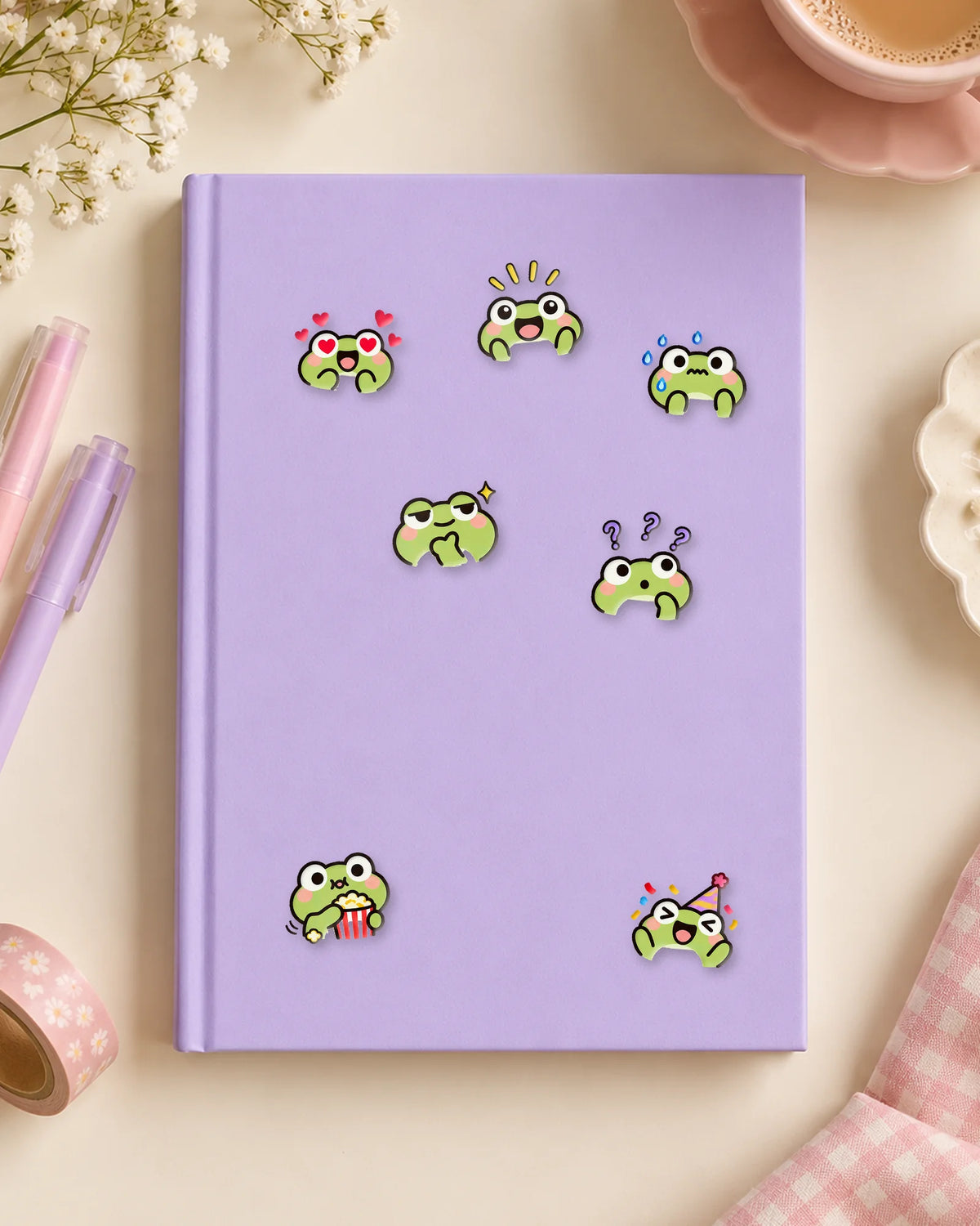 Froggy Feels mini patches on a journal