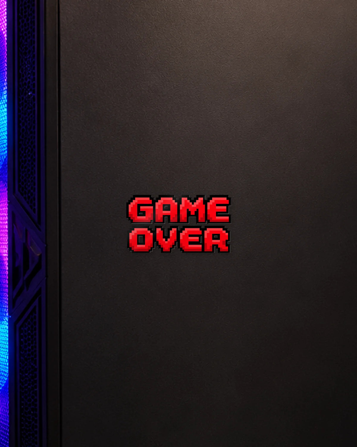 Game Over gamer patch on a gaming PC cabinet