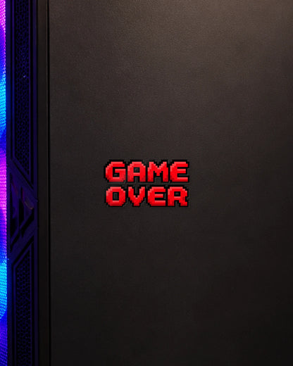Game Over gamer patch on a gaming PC cabinet