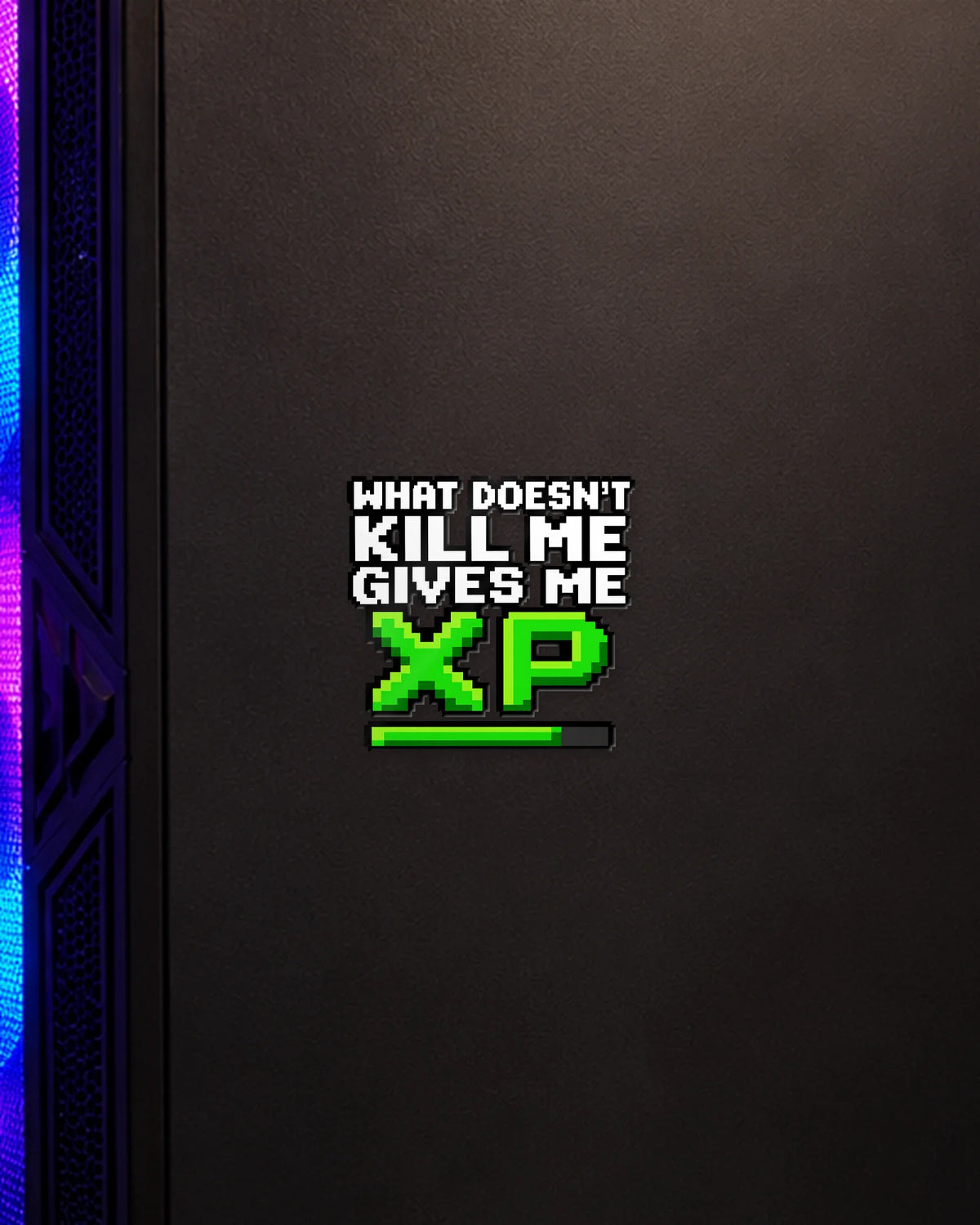 Gives Me XP gamer patch on a gaming PC cabinet